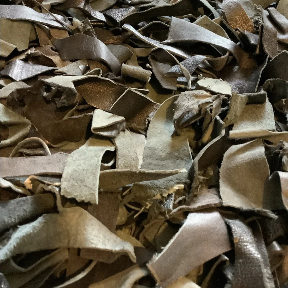 Leather scraps rug 20” by 37 1/2”